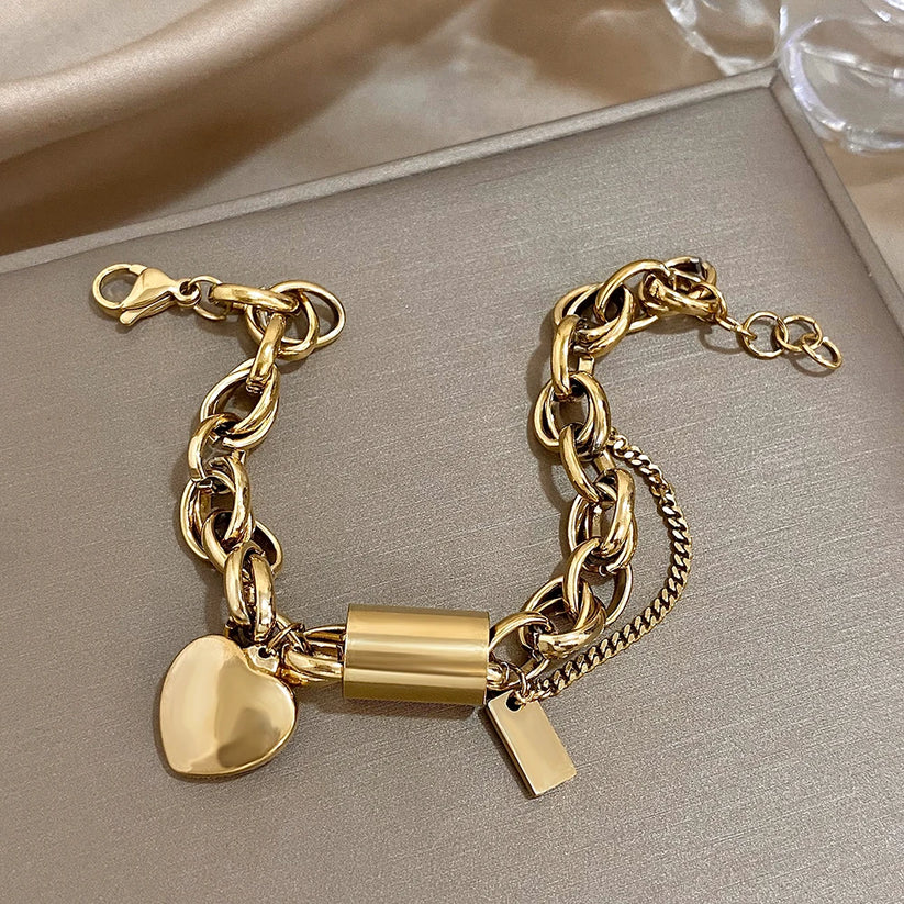 Bracciale spesso a forma di cuore in oro